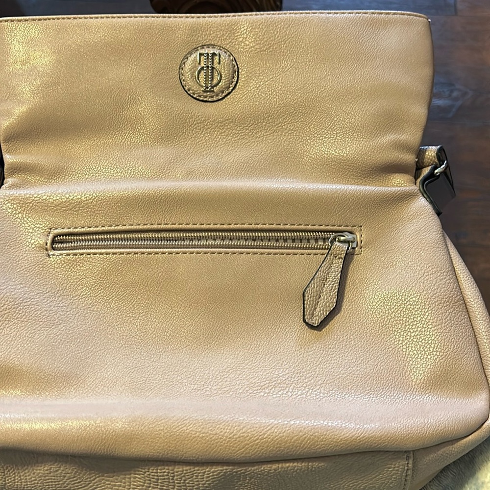 Jennifer Lopez tan purse good used condition